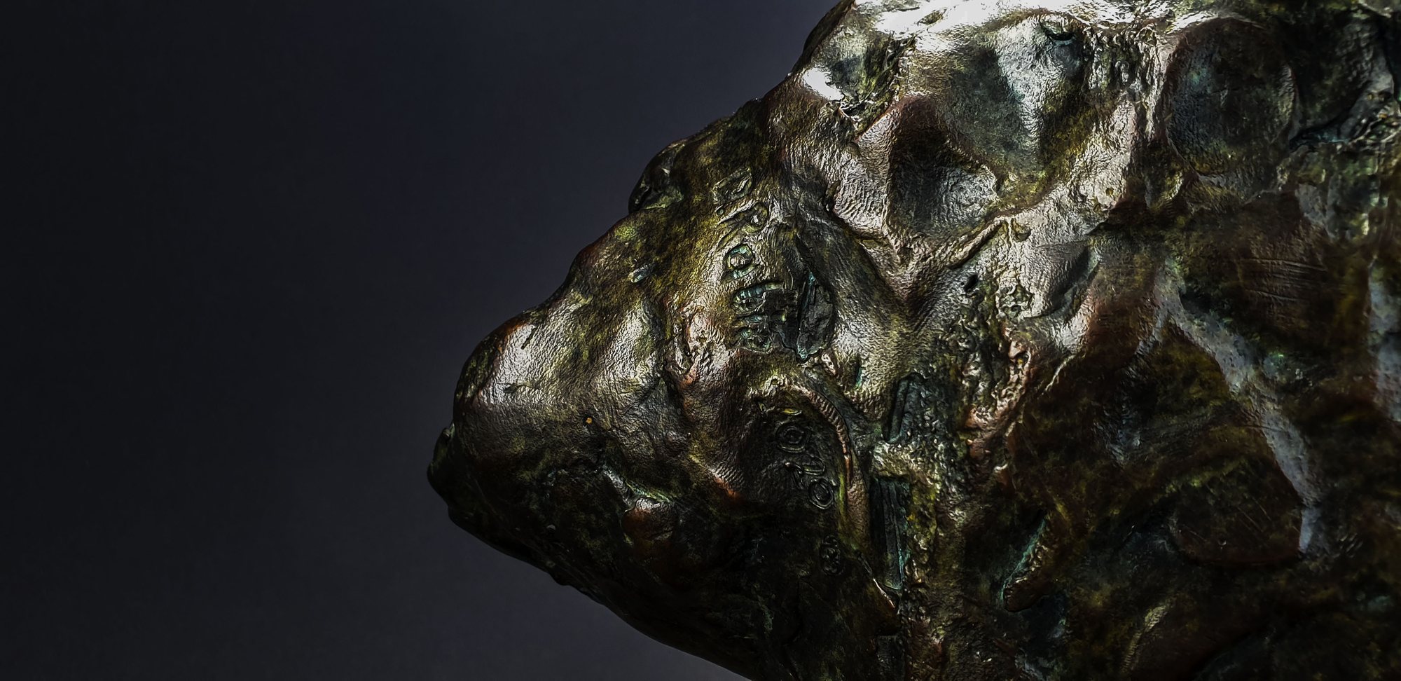Signature and date, cast into the bronze